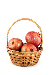 pomegranates in a basket