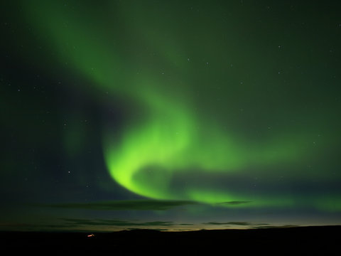 Northern lights in Reykjahlíð near Mývatn lake