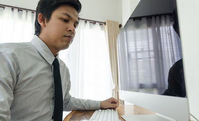 Business man working with computer in home office