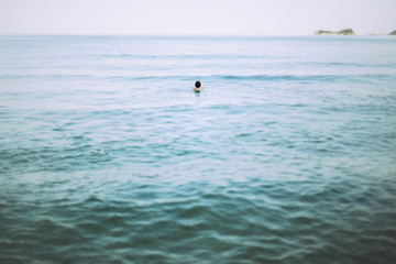 Fototapeta premium Swimming in the sea