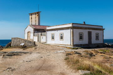 Fototapeta na wymiar Old residence of the lighthouse keeper in Corrubedo Cape, Galicia (Spain)