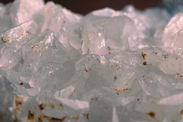 white calcite mineral on the wooden background