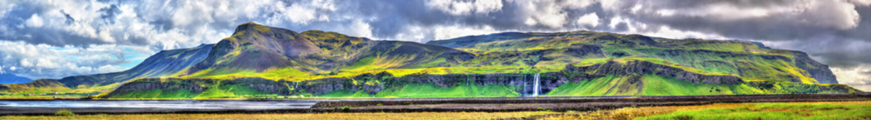 Panorama of volcanic massif Eyjafjoll with Seljalandsfoss and Gljufrafoss waterfalls - Iceland © Leonid Andronov