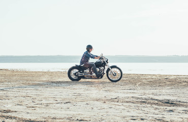 Obraz na płótnie Canvas man riding motorcycle