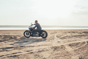 Fototapeta na wymiar man riding motorcycle