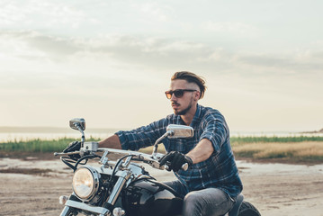 man riding motorcycle