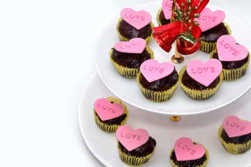 chocolate cup cake decorated with hearts for Valentines day