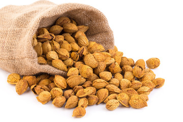 Almond nut in shell and shelled isolated on white background