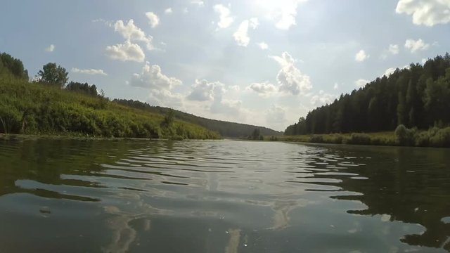 Flowing on kayak down the river