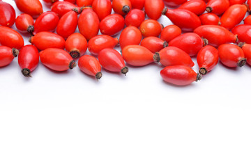 Obraz premium Rose hips (Rosa canina) isolated on white background.