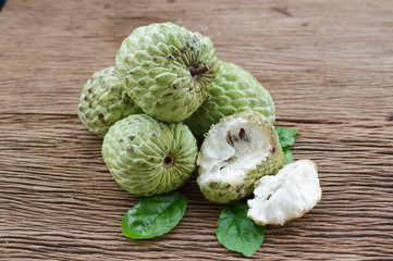 Custard apple fruit on the wood table.
