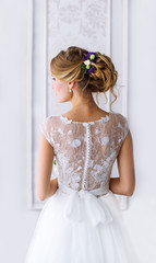 Bride. A young girl in  white dress.