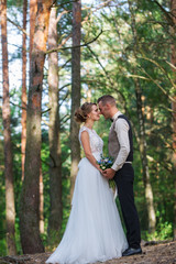 High trees and kiss of the married couple