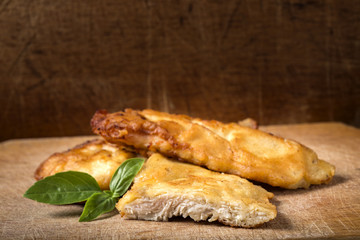 Fried chicken schnitzel with basil