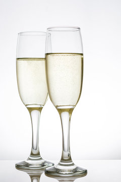 Champagne glass cups on white background

