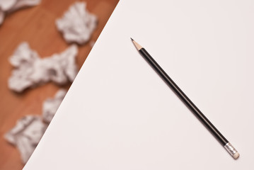 Black Pencil On A White Paper