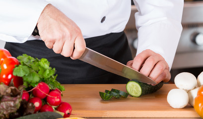 Chef chopping vegetables