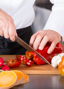 Chef chopping vegetables