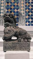 The beautiful of lion  stone chinese style sculpture and thai art architecture in   the Emerald Buddha temple(Wat phra kaew) and Royal Grand Palace ,Bangkok,Thailand.