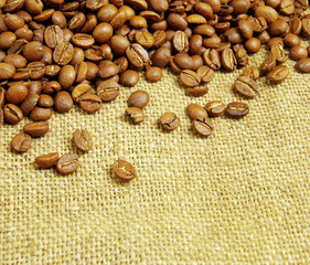 coffee beans on burlap background