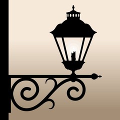 Silhouette of an old lantern with a candle. Vector illustration.