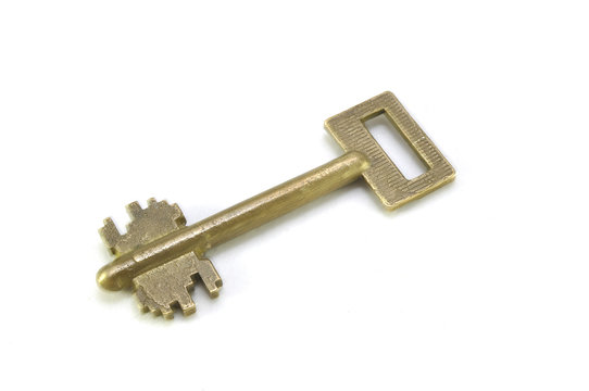 Старинный ключ на белом фоне крупным планом, ключ, бронза, старина, свобода