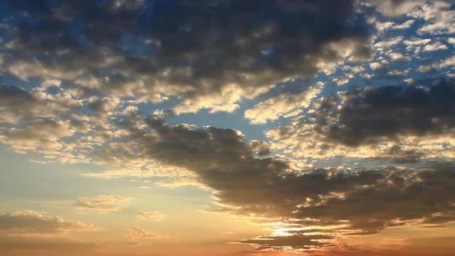 Timelapse of Clouds at sunset just before the night. Colorful sunset, HD time lapse clip, high dynamic range imaging