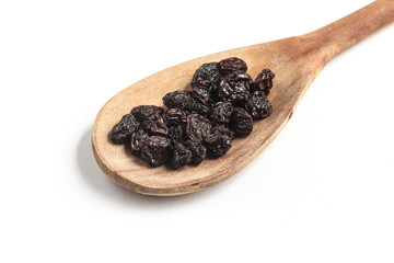 Dried Grapes into a spoon