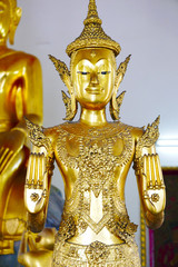Buddha gold statue and thai art architecture in Wat Phra Chetupon Vimolmangklararm (Wat Pho) temple in Thailand.