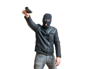 Robber or thief aiming with pistol. Isolated on white background.
