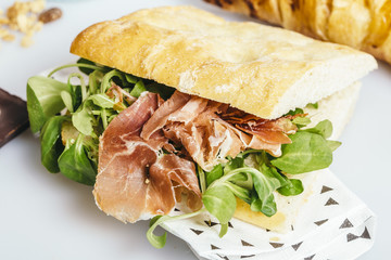 Ham and green salad sandwich breakfast