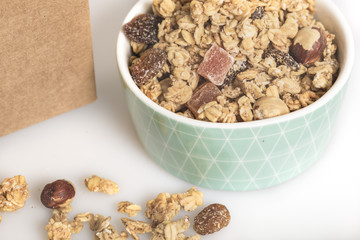 Fresh cereals on a green bowl