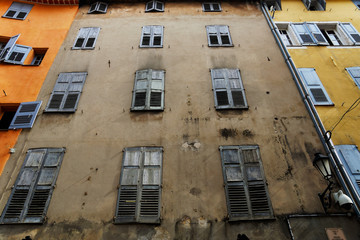 Building facade with its shutters closed