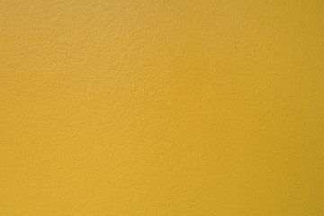 Naklejka premium Yellow concrete wall
