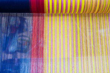 Yarn pattern is set up on the loom bench and ready to weave.