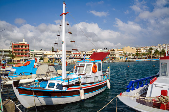 Traditional Greek fishing boat at port of Sitia town at eastern part of Crete island