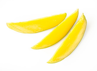 Mango fruit slaced on white background isolated. Top view.