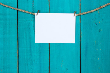 Blank with sign hanging from clothesline