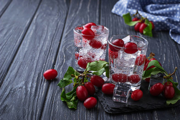 Cold summer drink with red berries