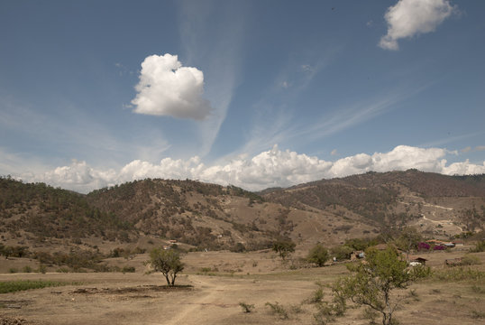 Backgrounds, Blue, Cloud, Color, Day, Forest, Grass, Green, High, Hill, Landscape, Locations, Mountain, Nature, No, Outdoors, Peak, Range, River, Road, Rock, Rural, Scene, Scenics, Sky, Stone, Stream,