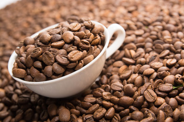 Cup with Beans on White Background