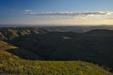 Naklejka premium Photograph of the mountains of Tavira with the sea on the horizon, Algarve, Portugal