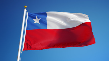 Chile flag waving against clean blue sky, close up, isolated with clipping path mask alpha channel transparency