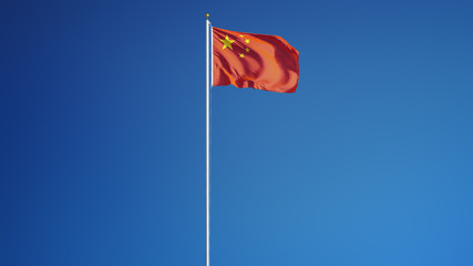 China flag waving against clean blue sky, long shot, isolated with clipping path mask alpha channel transparency