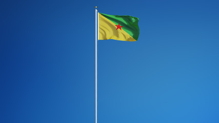 French Guiana flag waving against clean blue sky, long shot isolated with clipping path mask alpha channel transparency digital composition