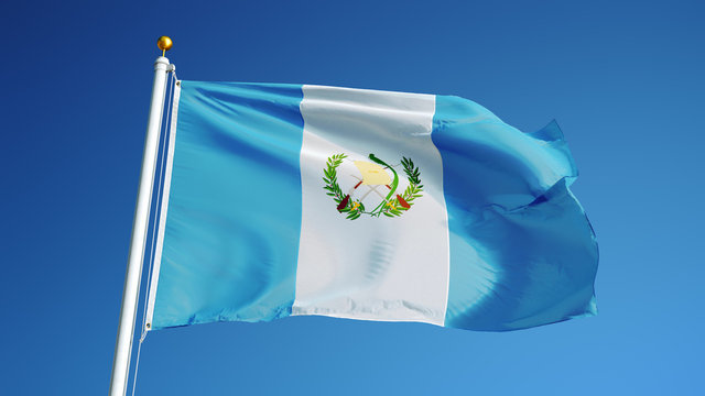 Guatemala flag waving against clean blue sky, close up, isolated with clipping path mask alpha channel transparency