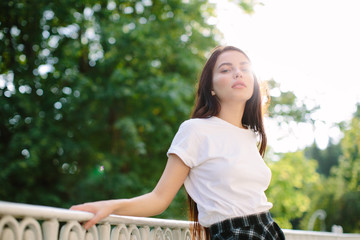 Naklejka premium Attractive girl posing outdoor