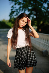 Naklejka premium Attractive girl posing outdoor