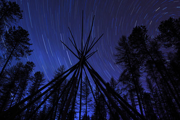 Star Trails Over An Old Teepee Frame