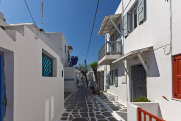Fototapeta na wymiar Street with white houses in town of Mykonos, Cyclades Islands, Greece